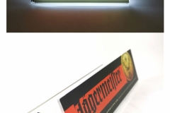 Jägermeister Motion Activated Lit Shelf TalkerAcrylic lit shelf talker with 4cp graphics, motion activated, LEDs positioned to light bottles behind shelf mounted display